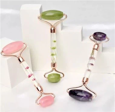 Πραγματικό λουλούδι εγχυμένο χειριστήριο jade roller